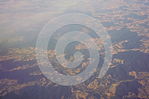 View of the earth landmass seen from an airplane window from Venice to Schiphol