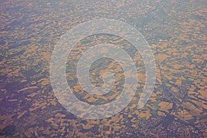 View of the earth landmass seen from an airplane window from Venice to Schiphol