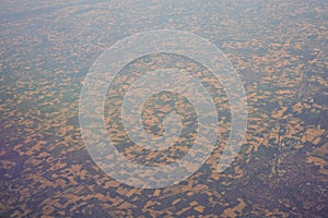 View of the earth landmass seen from an airplane window from Venice to Schiphol