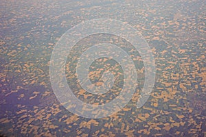 View of the earth landmass seen from an airplane window from Venice to Schiphol