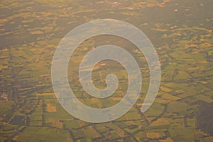 View of the earth landmass seen from an airplane window from Venice to Schiphol