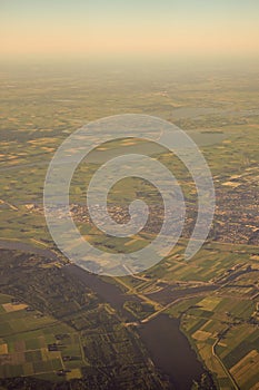 View of the earth landmass seen from an airplane window from Venice to Schiphol