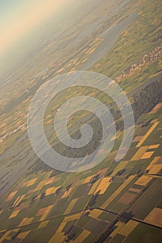 View of the earth landmass seen from an airplane window from Venice to Schiphol