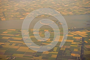 View of the earth landmass seen from an airplane window from Venice to Schiphol