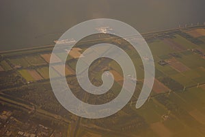 View of the earth landmass seen from an airplane window from Venice to Schiphol