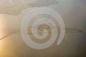 View of the earth landmass seen from an airplane window from Venice to Schiphol