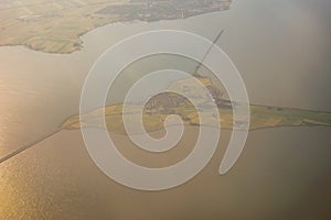 View of the earth landmass seen from an airplane window from Venice to Schiphol