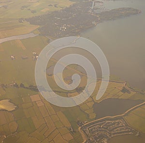 View of the earth landmass seen from an airplane window from Venice to Schiphol