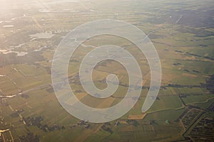 View of the earth landmass seen from an airplane window from Venice to Schiphol