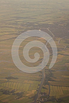 View of the earth landmass seen from an airplane window from Venice to Schiphol