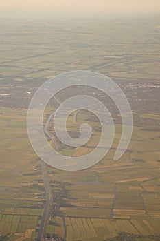 View of the earth landmass seen from an airplane window from Venice to Schiphol