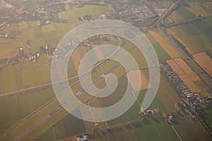 View of the earth landmass seen from an airplane window from Venice to Schiphol