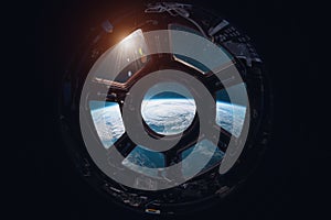 View on Earth planet from ISS station porthole. Elements of this image furnished by NASA
