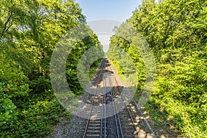 A view east along the railway line beside the River Hamble