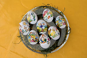 View on easter eggs on a yellow tablecloth