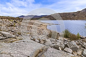 A view eastward along the shoreline of Loch Cluanie, Scotland