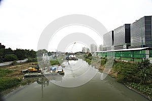 View of the Eastwood City on the right and Marikina on the left from the Marikina River photo