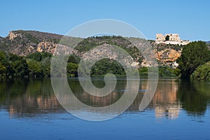 Ebro River and Templar castle of Miravet, Spain photo