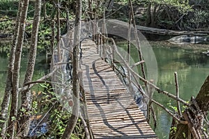 View of ecological bridge, made with recycled materials, in pedestrian route in the DÃƒÂ£o river