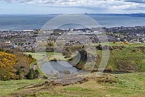 View of Edinburgh towards North Sea from Arthurâ€™s Seat, highest point in Edinburgh at Holyrood Park, Scotland, UK