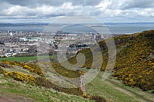 View of Edinburgh towards North Sea from Arthurâ€™s Seat, highest point in Edinburgh at Holyrood Park, Scotland, UK