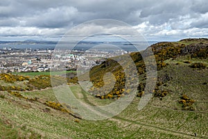 View of Edinburgh towards North Sea from Arthurâ€™s Seat, highest point in Edinburgh at Holyrood Park, Scotland, UK