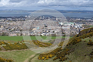 View of Edinburgh towards North Sea from Arthurâ€™s Seat, highest point in Edinburgh at Holyrood Park, Scotland, UK