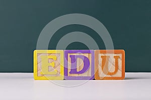 View of EDU wooden letter blocks