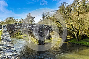 A view of the eighteenth century, grade 2 listed bridge at Llawhaden that spans the River Cleddau, Wales