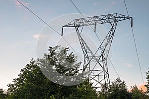 View of an electricity Pylon at sunset