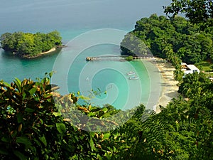 A view from elevatep point over beach in Parque Nacional de Isla Coiba, Panama photo