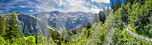 View of Elm village and Swiss mountains - Piz Segnas, Piz Sardona, Laaxer Stockli from Ampachli, Glarus, Switzerland, Europe