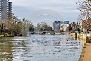 A view from the Embankment down the River Great Ouse towards the town bridge in Bedford, UK