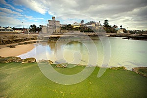 View of the embankment at low tide. Estoril, Lisbon, Portugal