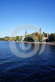 View of the embankment of the river Dahme from the `Lange Bruecke` bridge. Berlin, Germany