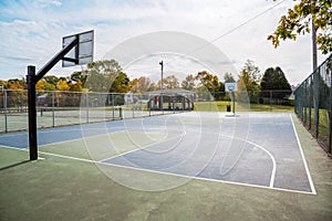 View of an empty basketball court in a public park