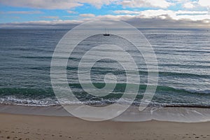 View of an empty beach in a overcast day.