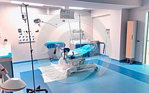 View of an empty hospital bed in the maternity ward at a hospital