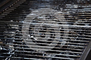 View of empty hot barbecue grill grate