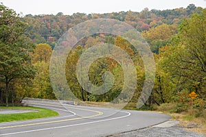 The view the empty road overlooking fall foliage near Point of Gap Overlook, Poconos, Pennsylvania, U.S.A