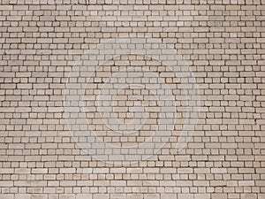 View of empty, white brick wall background with copy space. A deteriorating brick wall outdoors