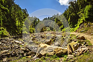 View enroute to Prashar Lake trekk trail through river bed. It is located at a height of 2730 m above sea level surrounded by