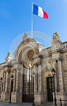 View of entrance gate of the Elysee Palace from the Rue du Faubourg Saint-Honore. Elysee Palace - official residence of