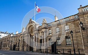 View of entrance gate of the Elysee Palace from the Rue du Faubourg Saint-Honore. Elysee Palace - official residence of