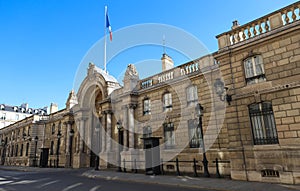 View of entrance gate of the Elysee Palace from the Rue du Faubourg Saint-Honore . Elysee Palace - official residence of