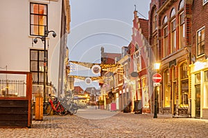 View at the entrance of the Roode Steen city center square with christmas decoration in the Dutch city of Hoorn, The Netherlands photo