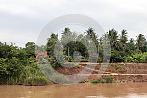 View of the eroded riverbank road.