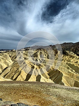 View of the erosional landscape in Zabriskie Point - Death Valley, California photo