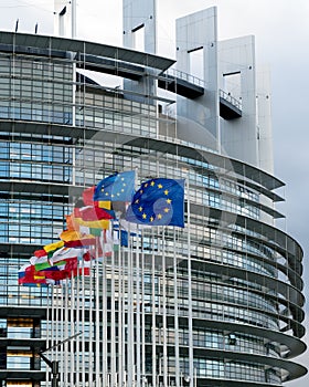 View of the European Union Parlament building and flags of all member states in Strasbourg