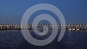 View of the evening Seoul bridge from Han River cruise ship